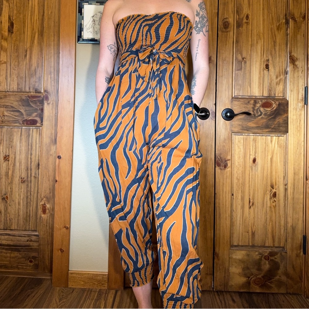 Elan Strapless Zebra-Print Jumpsuit in Burnt Orange and Navy